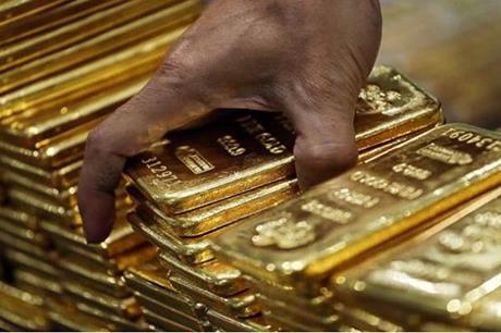 الذهب قرب أدنى مستوى في 3 أسابيع عالميا